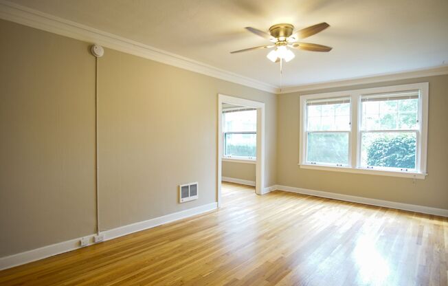 Ladd's Addition: Sunny Studio with Hardwoods + Lovely Architectural Appeal!