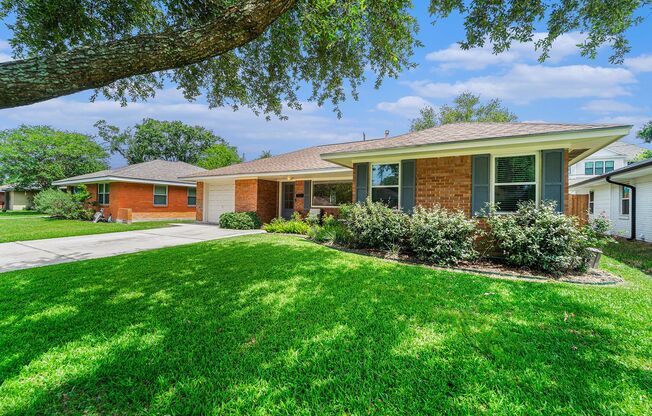 Beautifully Updated Home in Oak Forest with Spacious Yard and Prime Location