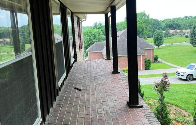 Single Family Home on almost an acre, 4 beds, 3 baths, Front Porch, Great Storage Space, and Great Yard