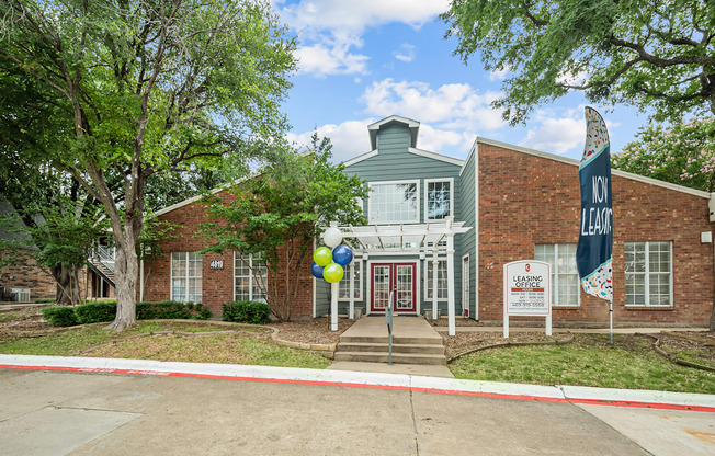A building with a sign that says "JOY LEADER" on it.