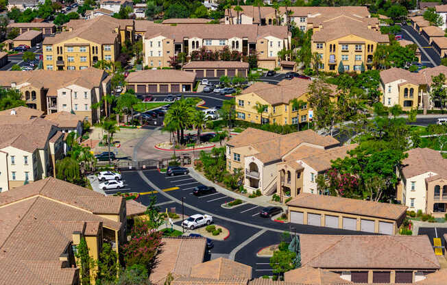 A residential area with houses and a road.
