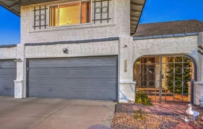 This stunning five-bedroom home, is an entertainer's dream!