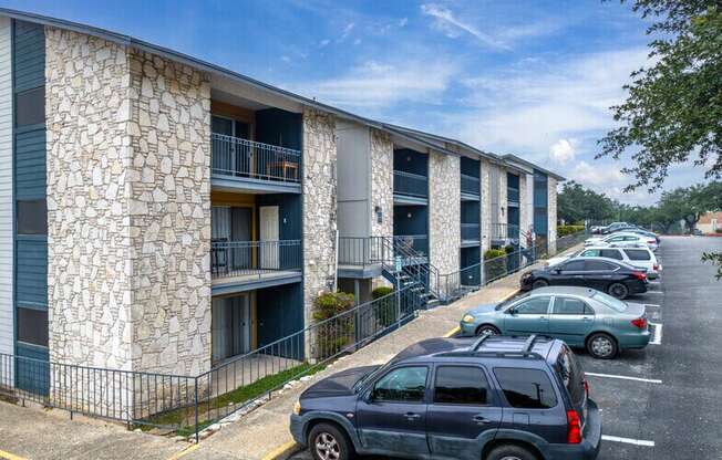 a building with cars parked in front of it