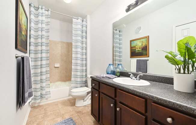 a bathroom with a sink and a toilet at Sovereign at Overland Park, Overland Park, 66213  