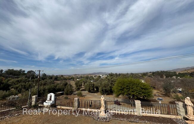 Spacious 4-Bedroom Retreat with Stunning Views & Multi-Generational Living in Menifee!