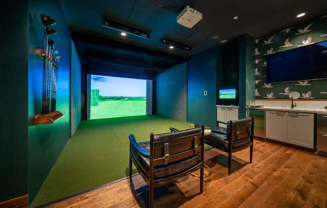 Golf simulator with seating and bar area