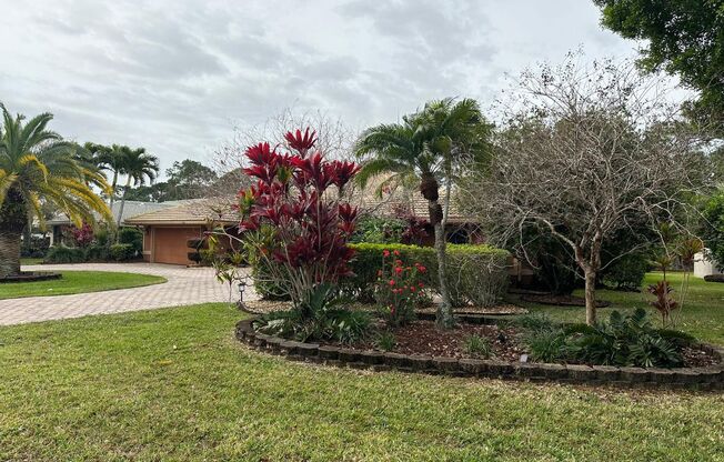 Tranquil Lakefront Living in the Heart of Port St. Lucie with Pool!