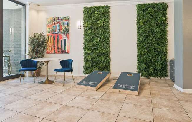 A room with a green wall and a blue chair.