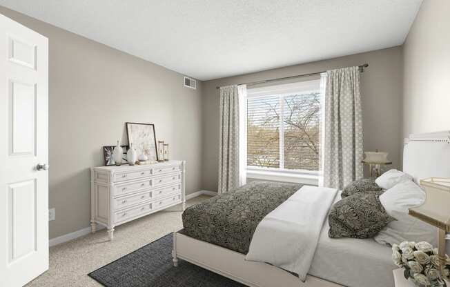 Cozy bed in bedroom at The Riverwood, Minnesota