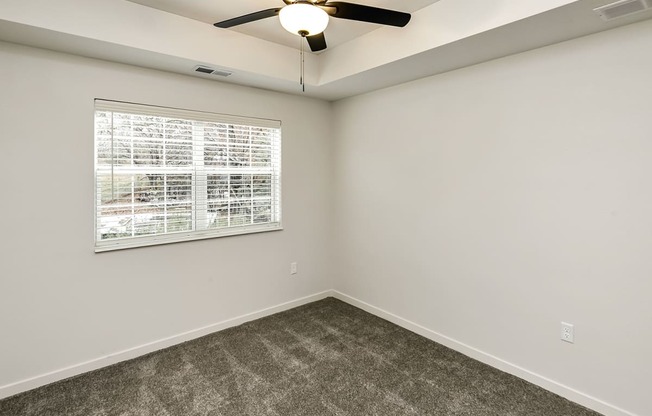 New building with white and dark color schemes with one, two and three bedroom apartment homes at CopperCreek Apartments in Council Bluffs, IA