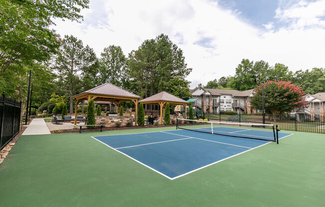 Blue Tennis Court at Elme Marietta Apartments, Marietta, GA, 30067