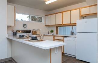 The Montavilla | Dogwood 2x1.5 K Kitchen with white appliance package