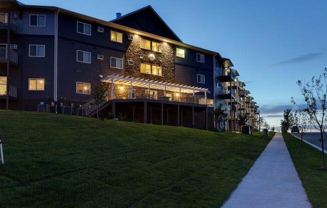 Night Exterior View of Bluffs of Williston Apartments ND