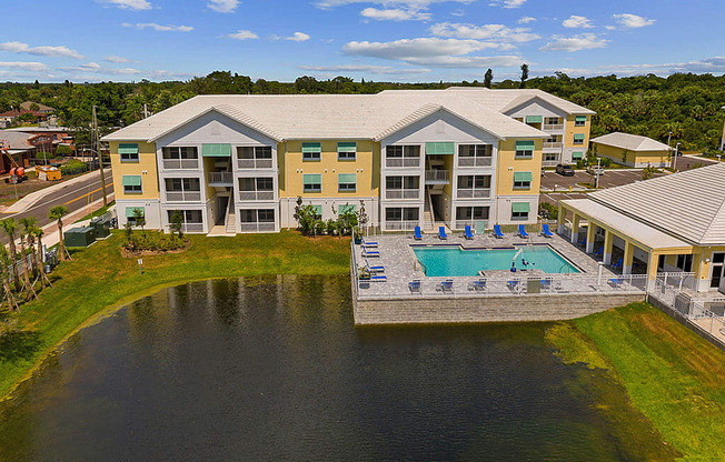 Aerial View Of Property With Lake at Waterline Bonita Springs, Florida
