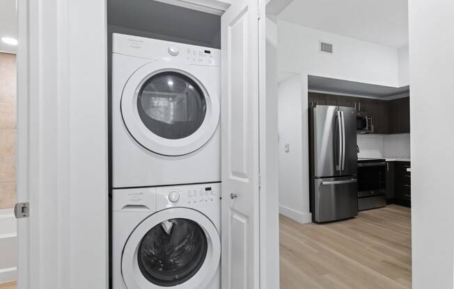 a front loading washer and dryer in a laundry room at One Plantation in FL 33324