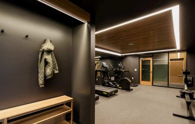 a coat hanging on a wall in a gym room at Slabtown Square Apartments, Portland , Oregon
