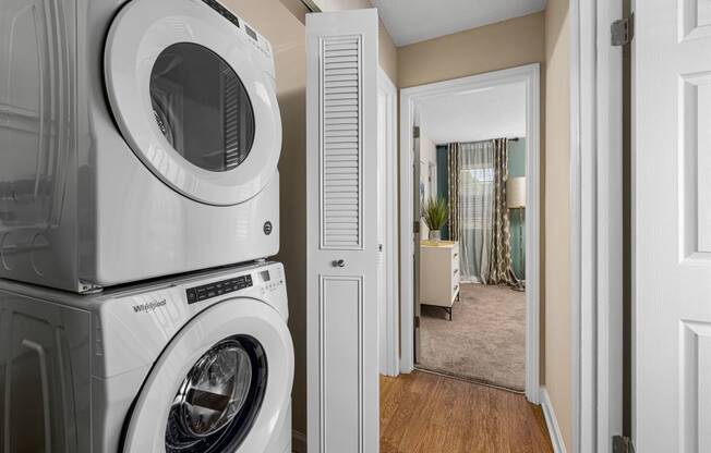 a washer and dryer in a laundry closet