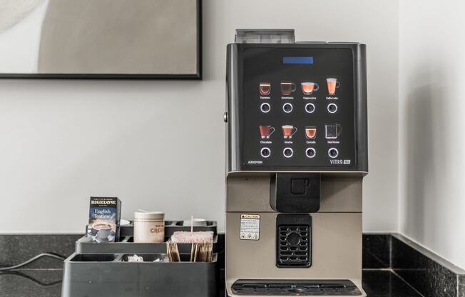 a coffee machine on a counter in a hotel room