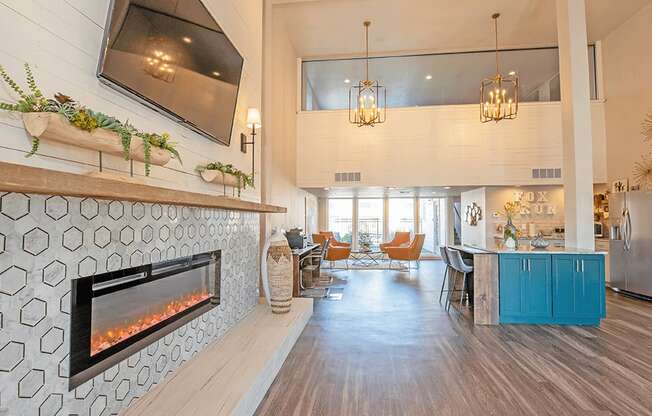 a living room with a fireplace and a television