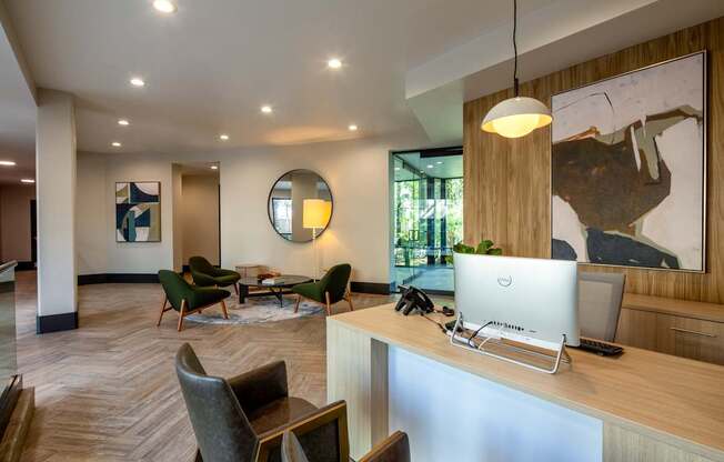 A modern office with a white Dell computer on a desk.