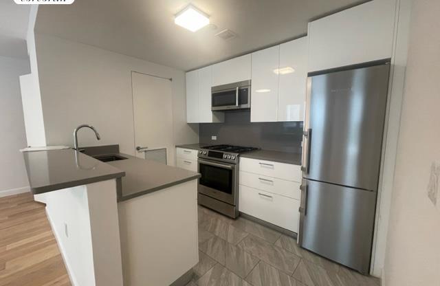 111 E 115 ST