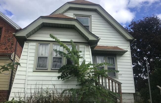 5 bedroom 2 bathroom single family home with detached