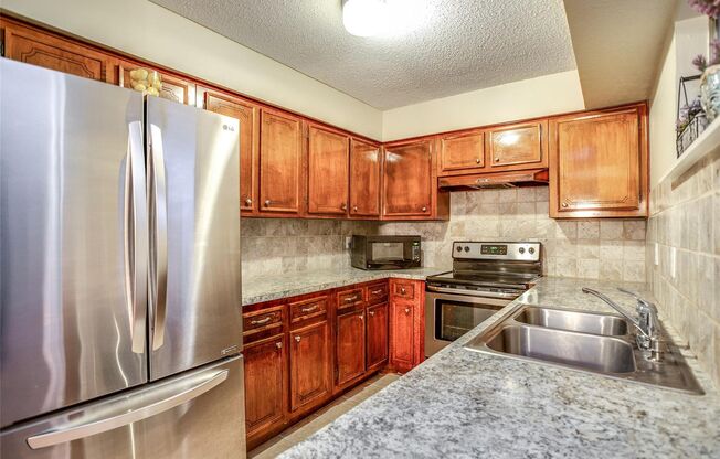 Small gated community of 39 units, conveniently located minutes from the Galleria and all that it offers. Second floor unit, overlooking the community pool, end unit with no neighbor to one side and no neighbor beneath. Washer/Dryer installed, stainless a