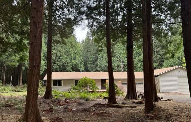 Cozy one story home on beautiful close to town acreage.