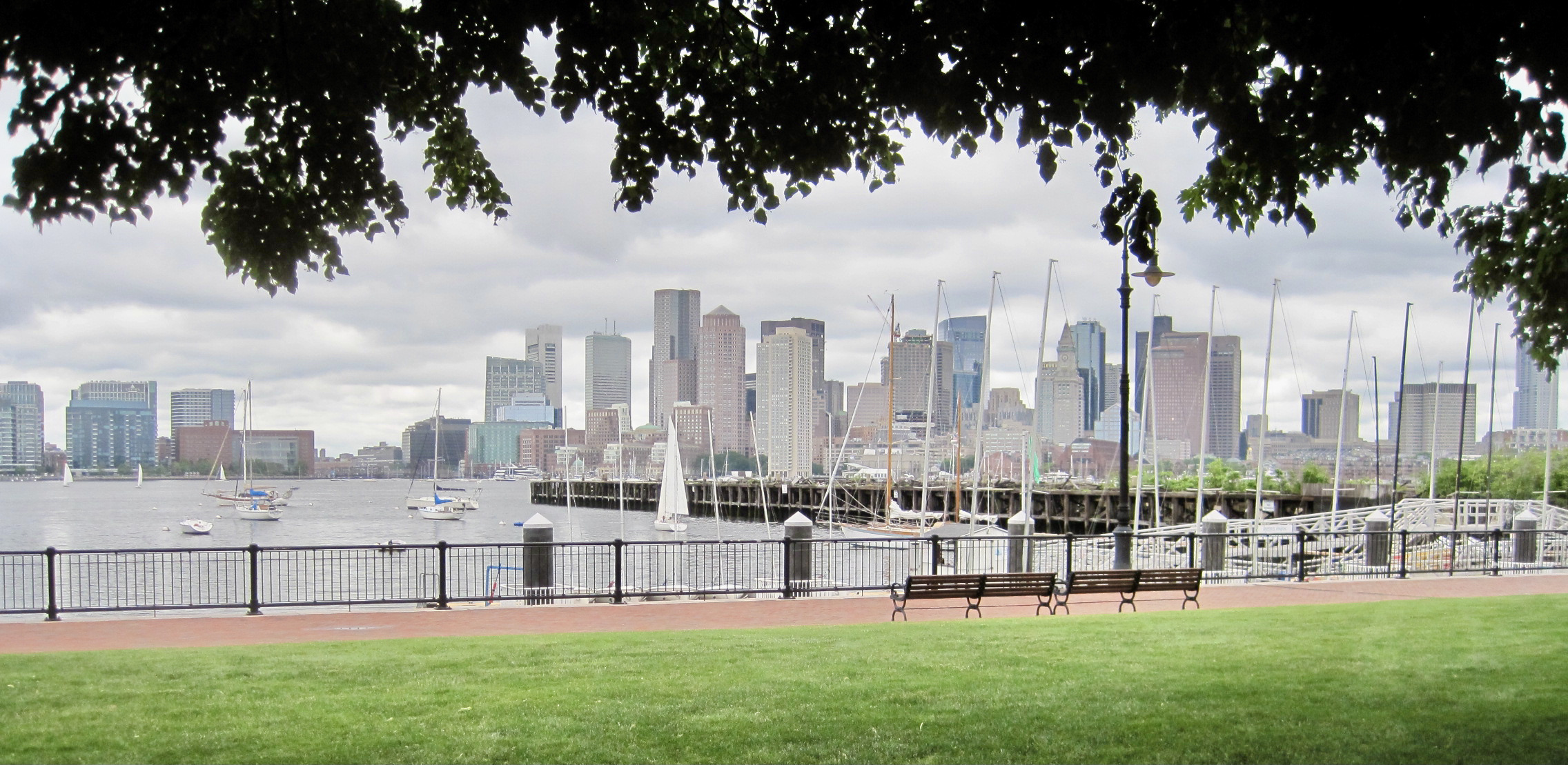 Photo of sailboats and Boston skyline from Piers Park in East Boston MA