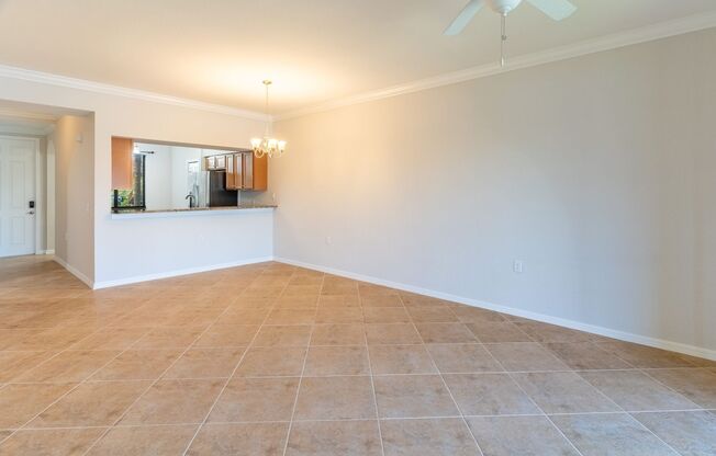 Stunning 2BR/2BA Acqua Ct. First-Floor Unit with Lake Views in Treviso Bay – Resort-Style Living Awaits!