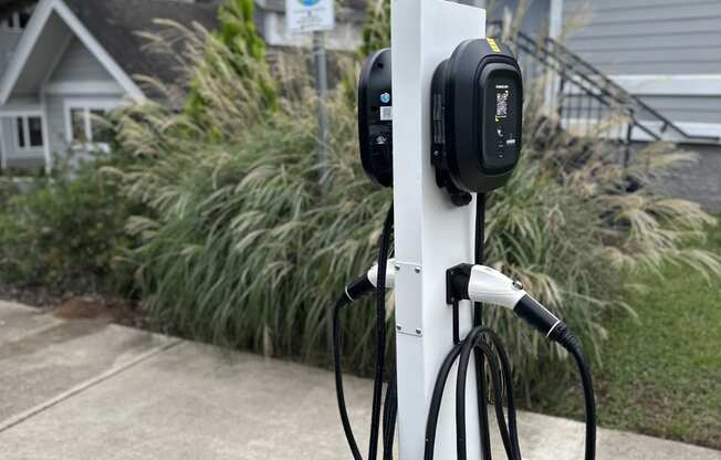 a electric charger in front of a house