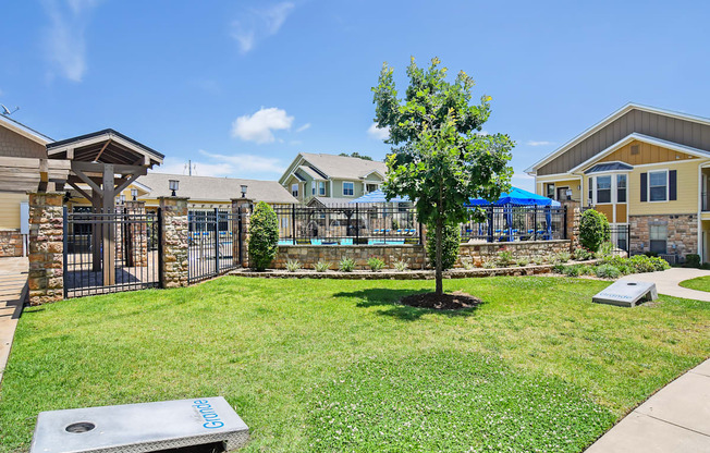 the preserve at ballantyne commons dog park with playground and tree