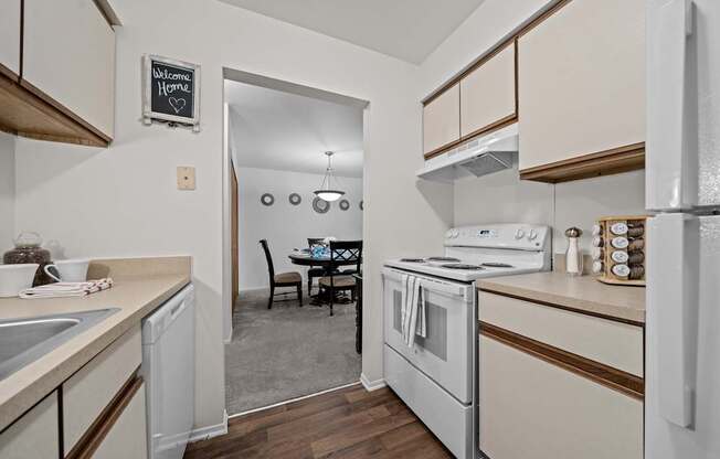 Cozy dining room connected to kitchen at Westwood Village Apartments in Westland, MI