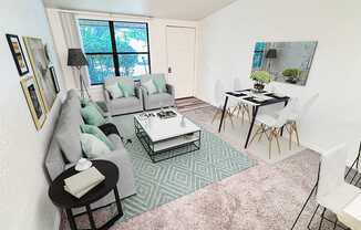A living room with a grey couch, a black coffee table, and a green rug.