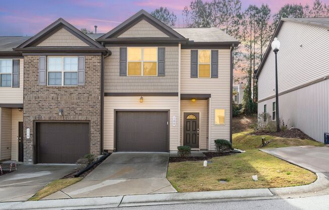 Welcome home! This pristine, end-unit townhome combines modern comfort, thoughtful upgrades, and low-maintenance living in an unbeatable Holly Springs location.