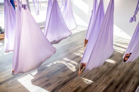 Group Doing Aerial Yoga