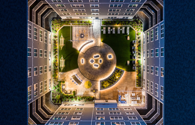 Courtyard at night The Q | Apartments In Quincy, MA for Rent