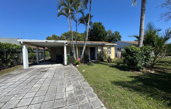 Large 4-1 house with car port and fenced backyard