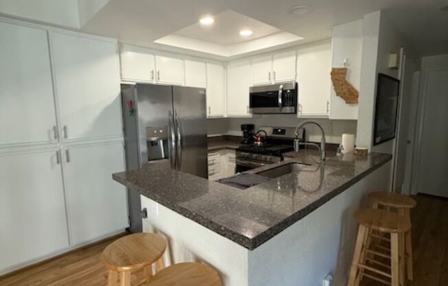 2 bed, 1.25 Bath CONDO next to POOL! Ground Level/Single Level. Attached 1 car GARAGE!