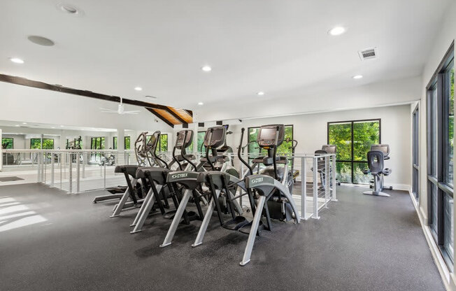 Community Fitness Center with Equipment at Dunwoody Village Apartments in Atlanta, GA.