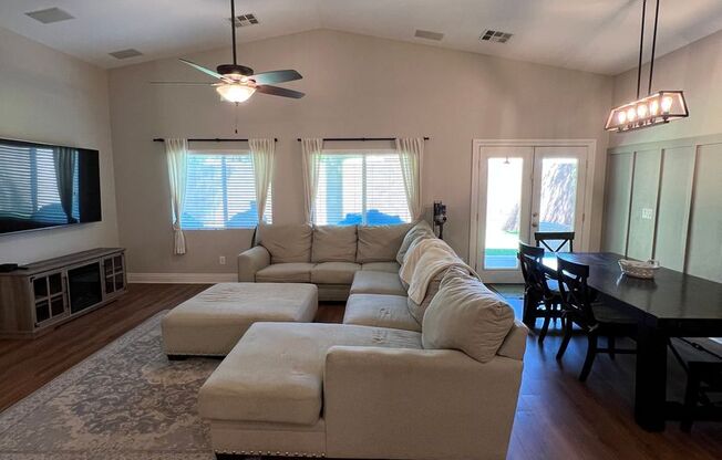 Gated Single Story Home with 3 car garage and upgrades galore!