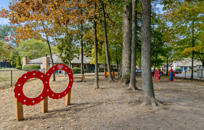 a playground with a large red and
