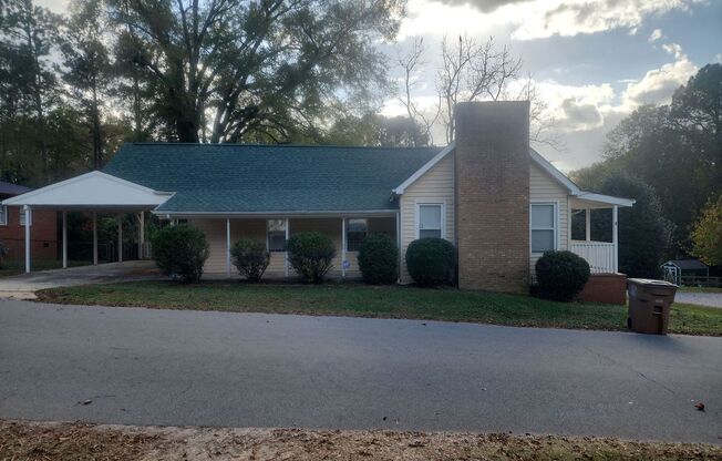 Cozy 3-Bedroom, 2-Bathroom Home with Fireplace, Carport, and Fenced Backyard in Wake Forest