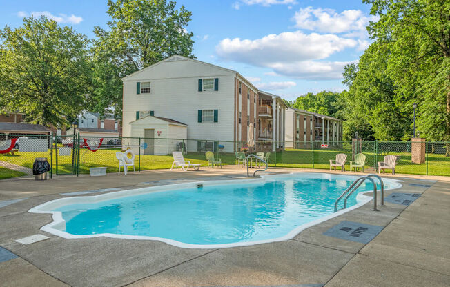 apartment complex with outdoor pool