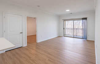 Living Room with Balcony and Hard Surface Flooring