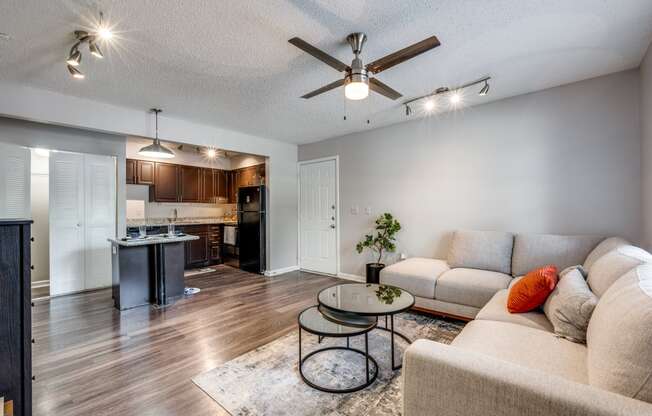 a living room with a couch and a table