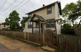 Tired of sharing walls with neighbors? Updated house with fenced yard