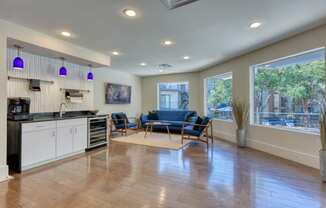 a kitchen and living room with a large window