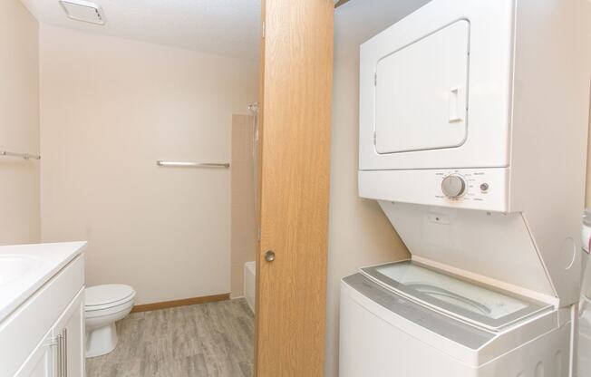 Upgraded bath with in-home washer and dryer at Cinnamon Ridge Apartments, Minnesota