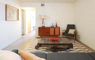 Scottsdale AZ Apartments - Winfield Scottsdale - Spacious Living Room with Concrete-Style Flooring